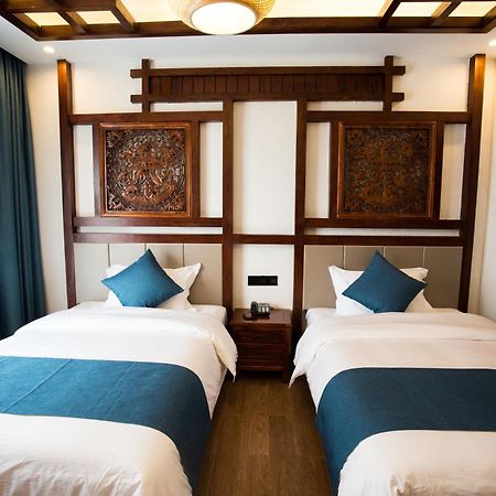 Apartamento 一树一花客栈眷恋店 Wulingyuan Exterior foto