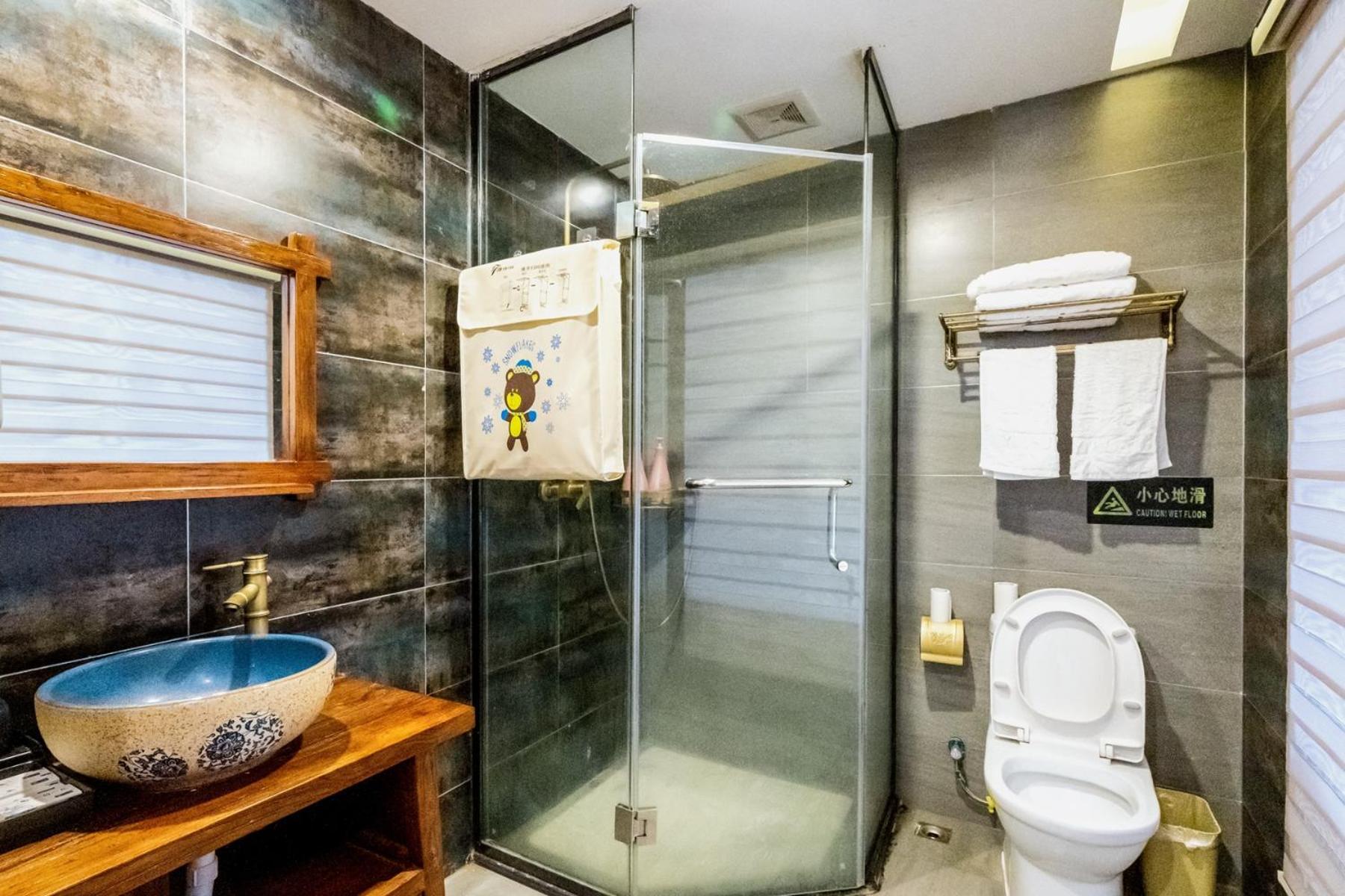 Apartamento 一树一花客栈眷恋店 Wulingyuan Exterior foto