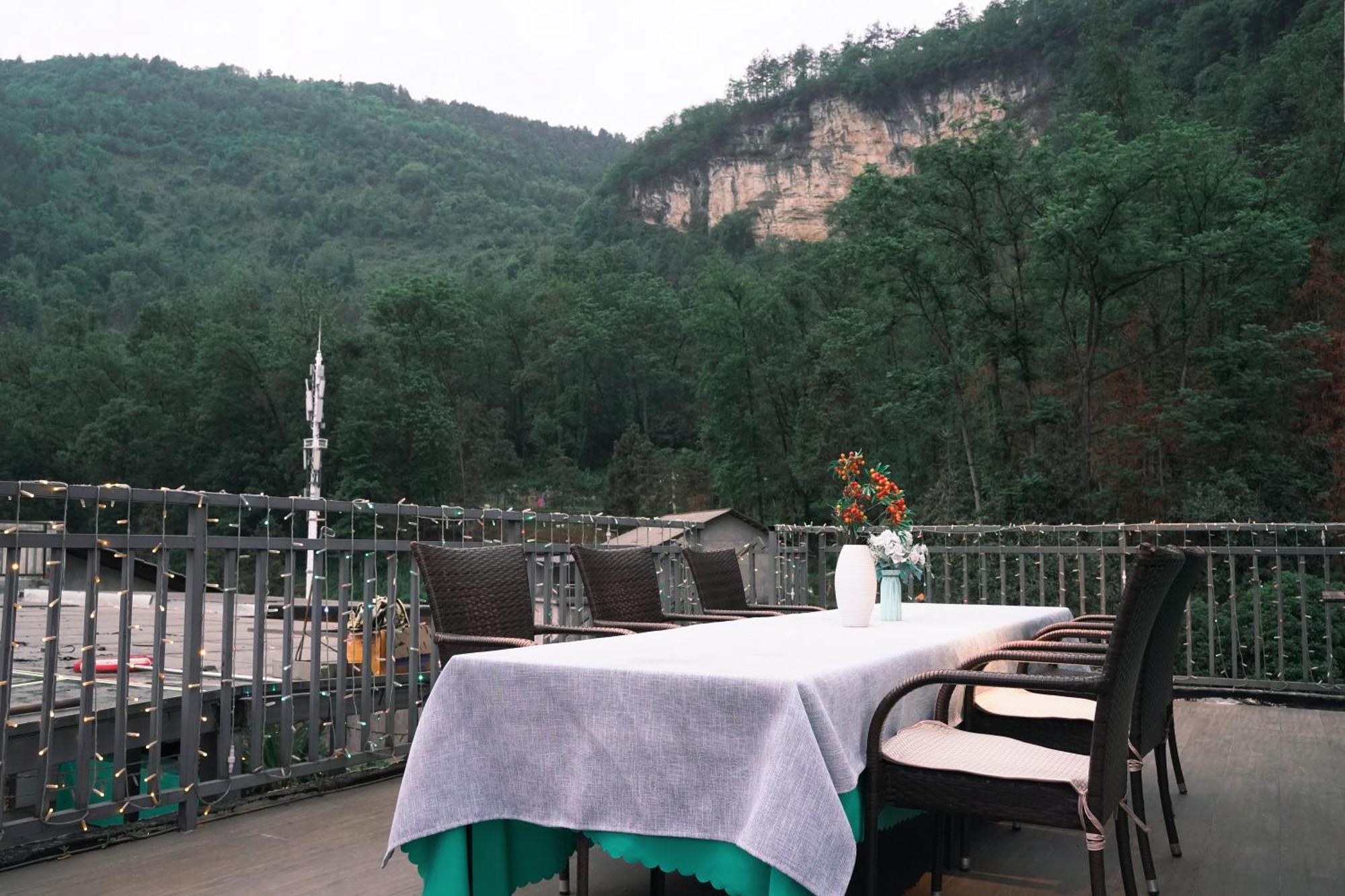 Apartamento 一树一花客栈眷恋店 Wulingyuan Exterior foto