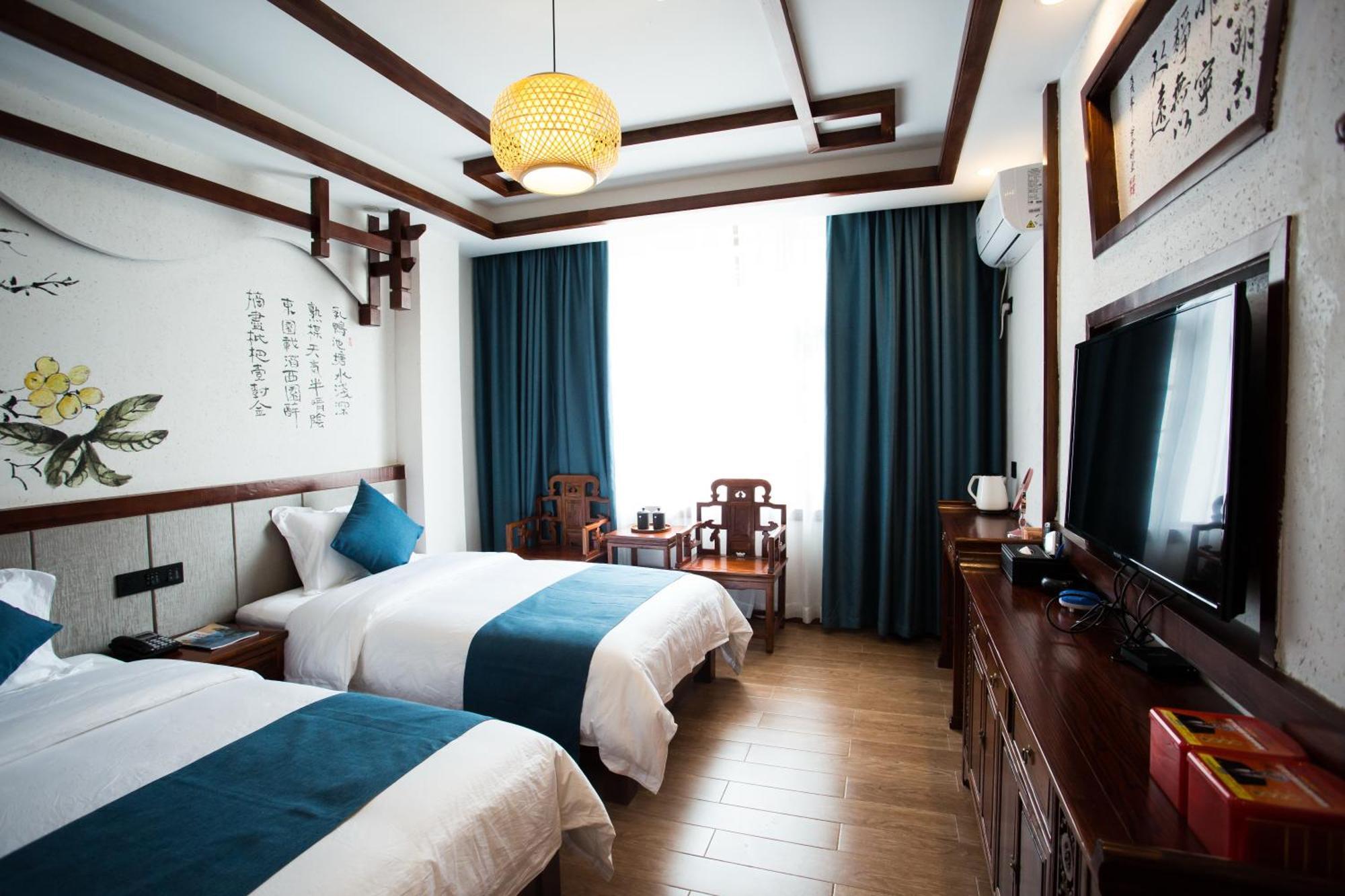 Apartamento 一树一花客栈眷恋店 Wulingyuan Exterior foto